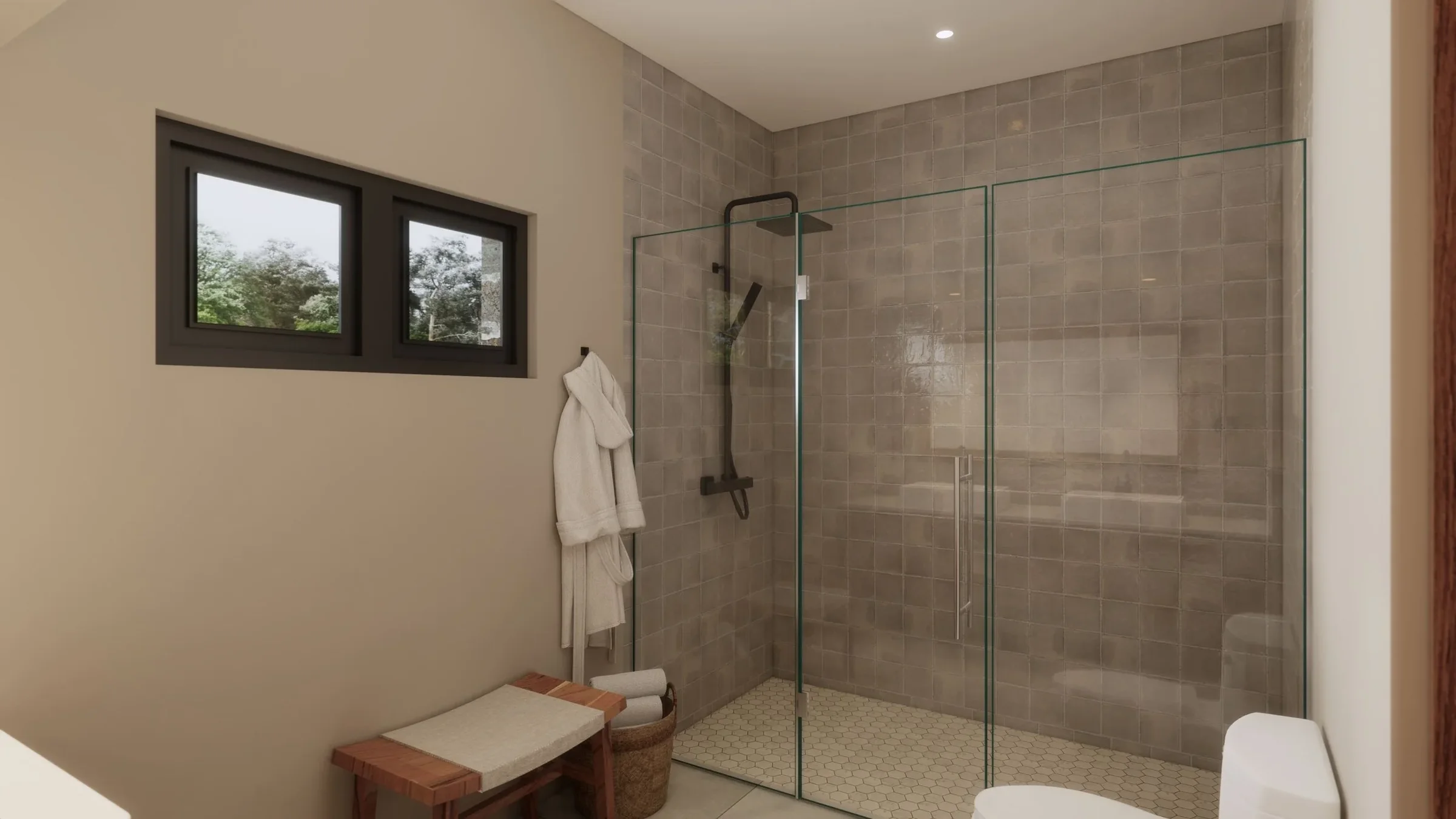 Modern bathroom with beige walls, two small windows, a walk-in glass shower with gray tiles, a wooden bench, a woven basket, and a white toilet.