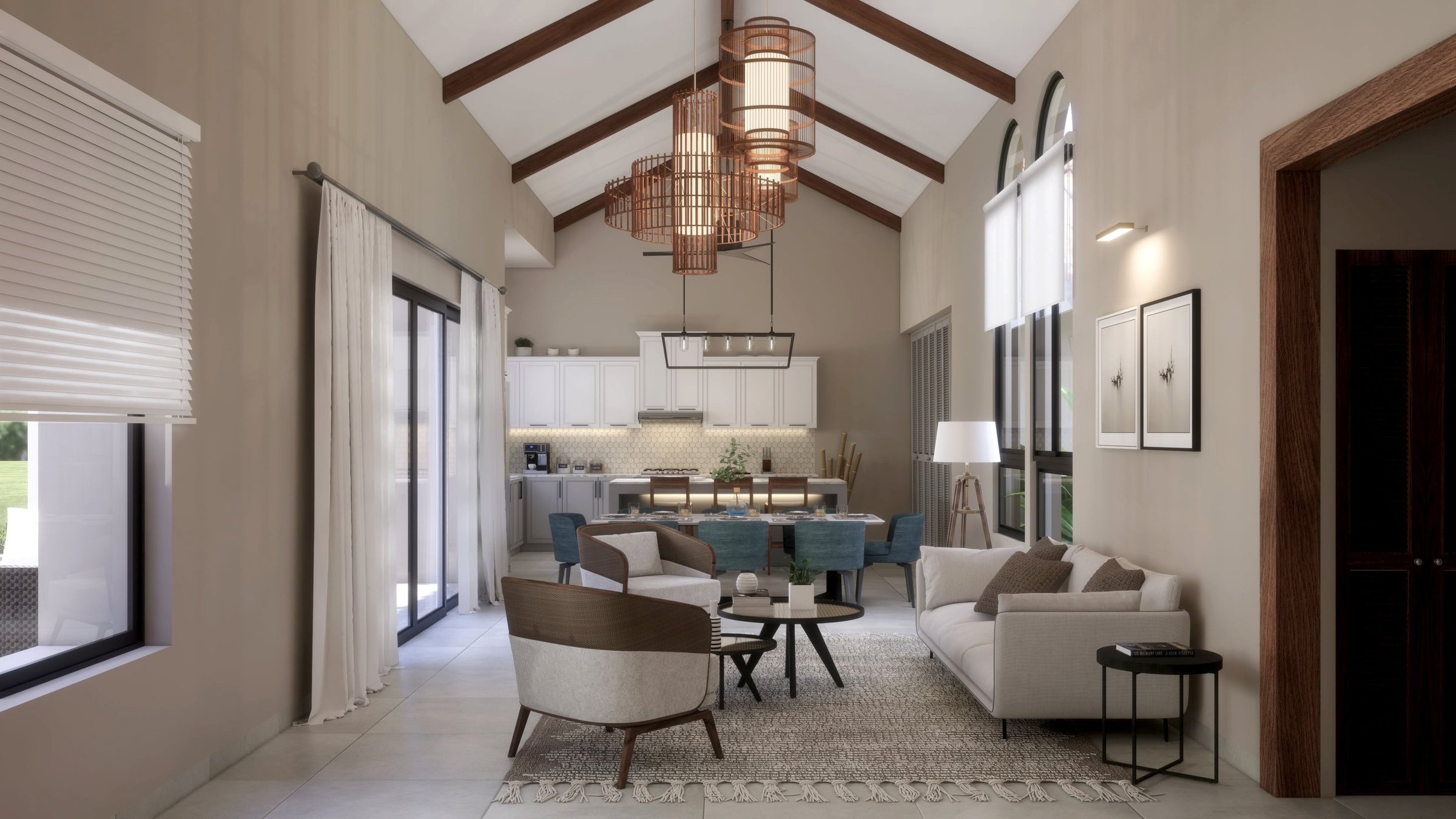 Living room with beige walls, white sofa, armchair, black side table, patterned rug, window blinds, and kitchen in the background with white cabinets and dining area.