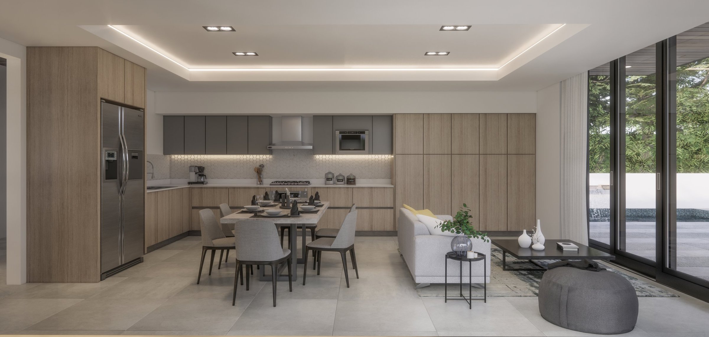 Modern open-concept kitchen and living room with wood and gray cabinetry, dining table, gray chairs, white sofa, black coffee table, large sliding glass doors, and greenery outside.