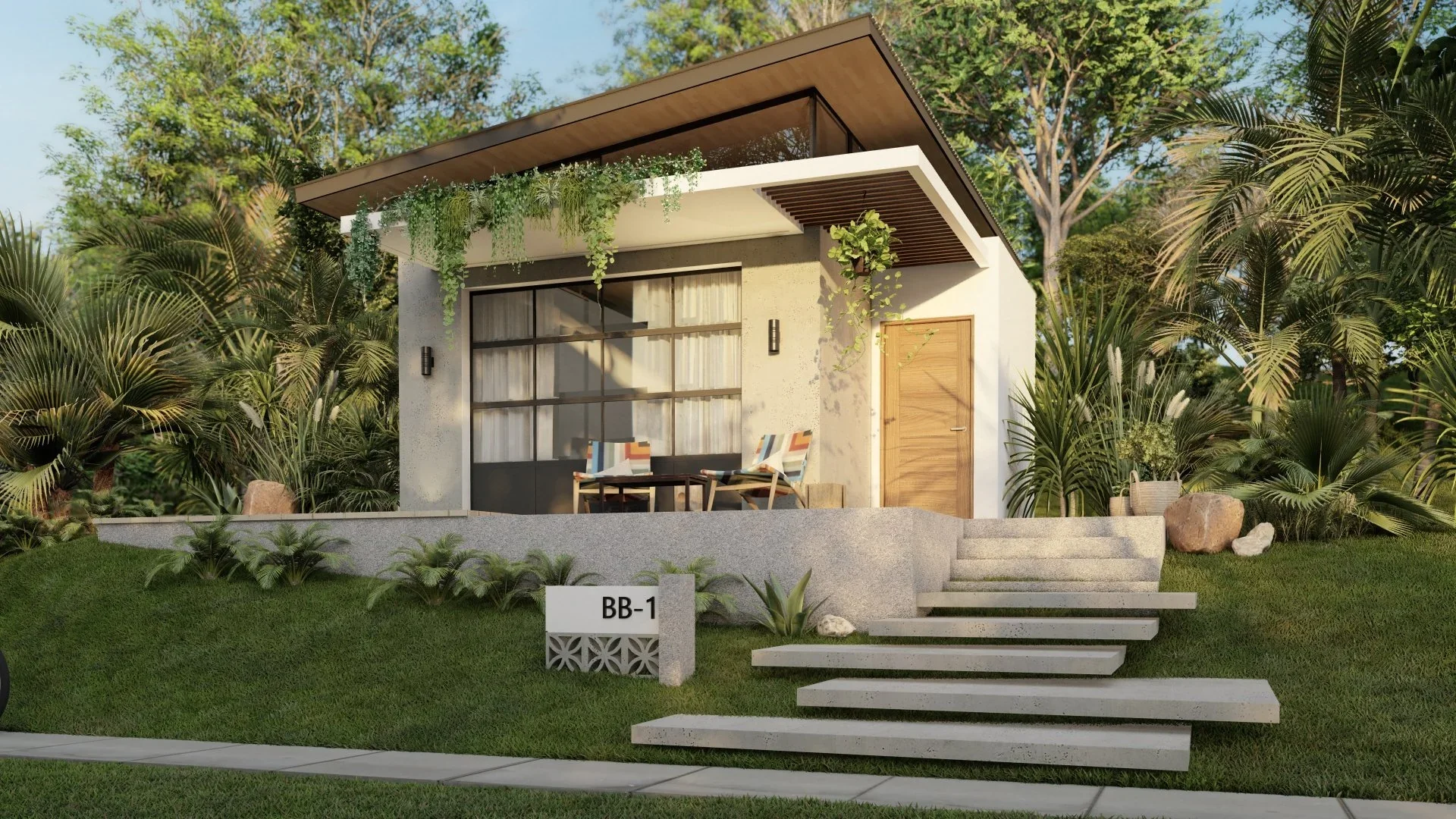 Modern small house with a sloped roof, large front window, and wooden door, surrounded by lush green plants and trees, with a patio featuring two chairs and a table.