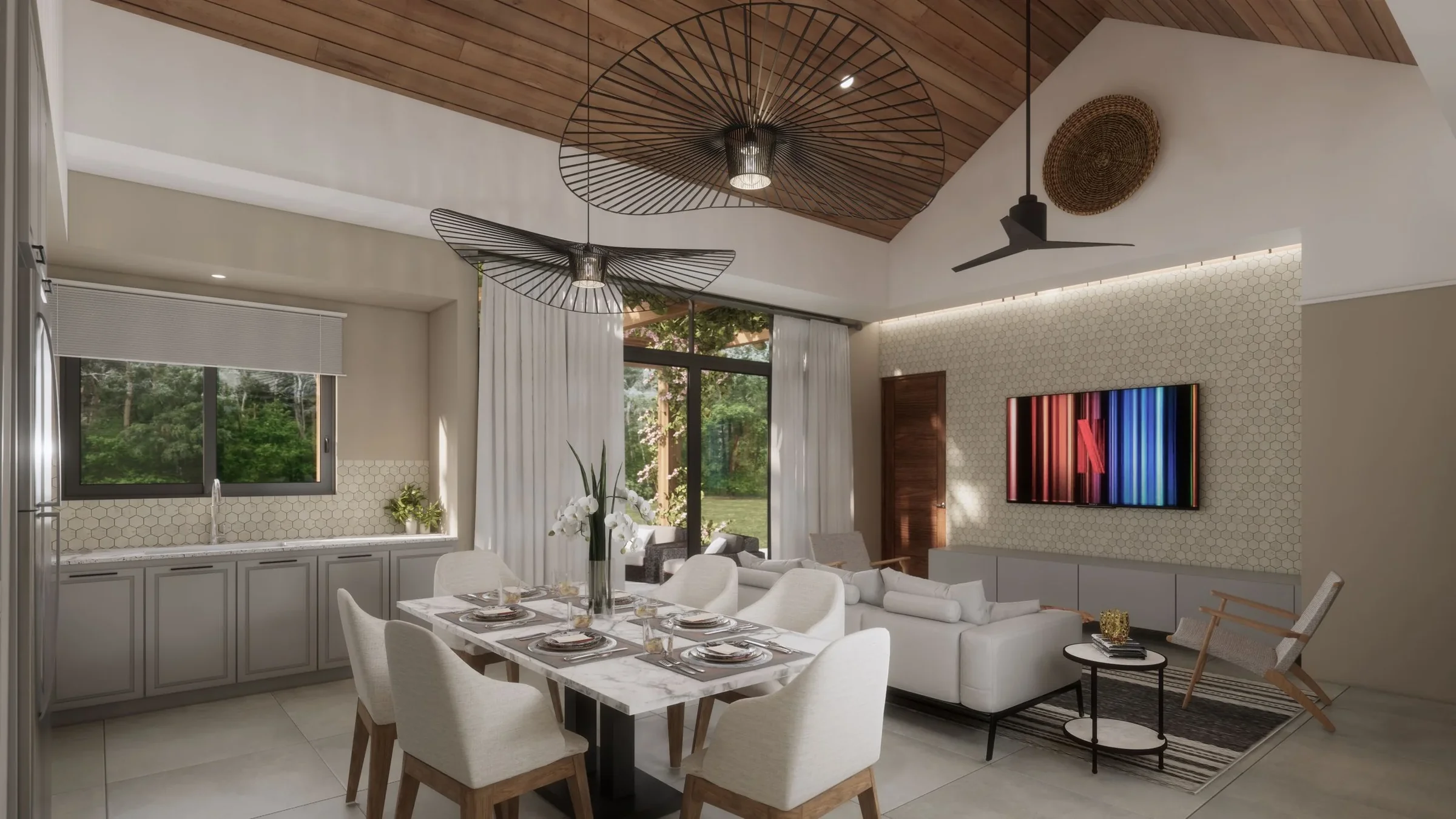 A modern open-plan living and dining area with large windows, white walls, wooden ceiling, ceiling fans, hanging light fixtures, a wall-mounted TV, a dining table with eight chairs, a white sofa, armchairs, a coffee table, and decorative plants and a