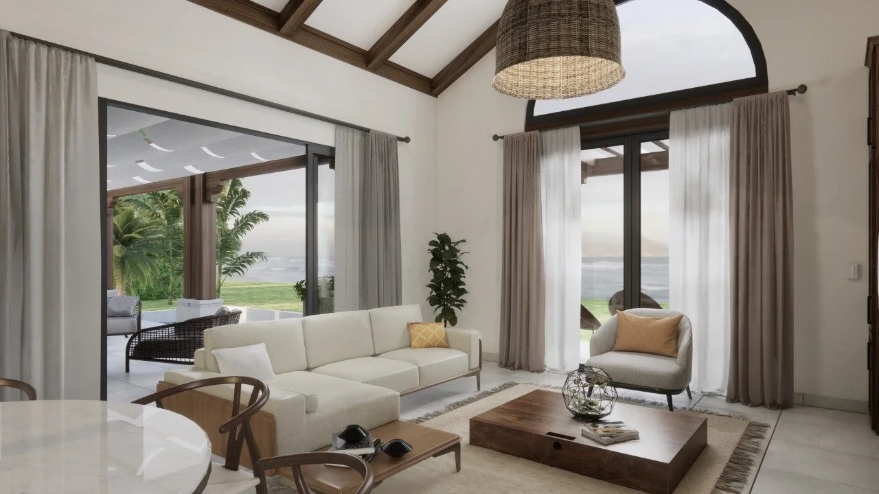 Living room with large sliding glass doors opening to a patio with outdoor furniture and a view of a green landscape and water. Interior features include a white sofa, an armchair with a beige pillow, a wooden coffee table, a potted plant, and neutra