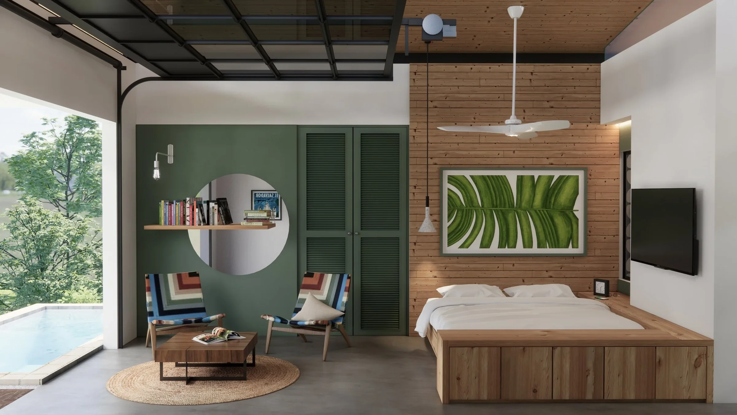 Modern bedroom with a wooden bed, art piece of large green leaves, TV on white wall, ceiling fan, cozy seating area with two chairs, circular mirror, bookshelf, and large window overlooking a pool and greenery.